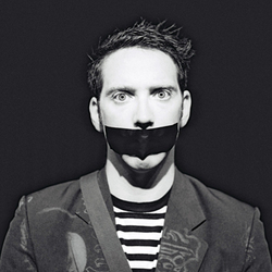 The Boy With Tape On His Face