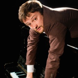 His voice and piano ability are strong, however he is let down by a raggedy first performance of fluffed lines and technical difficulties.