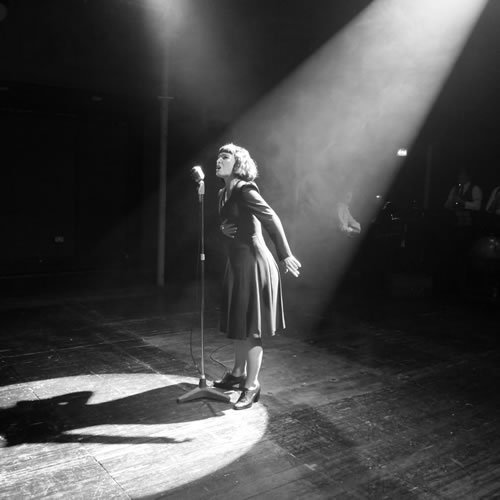 Cameron Leigh has a stunningly powerful voice, more than a match for the huge belting numbers from Piaf’s oeuvre. However she starts so big she has nowhere to go and the singing sequences feel repetitive well before the close of the first act.